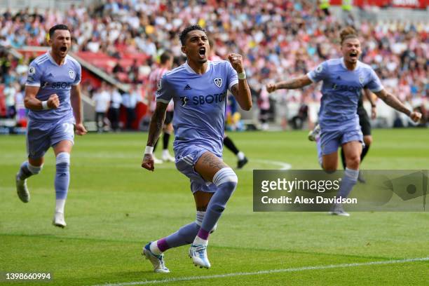 Raphinha of Leeds United celebrates after scoring their side's first goal from the penalty spot during the Premier League match between Brentford and...