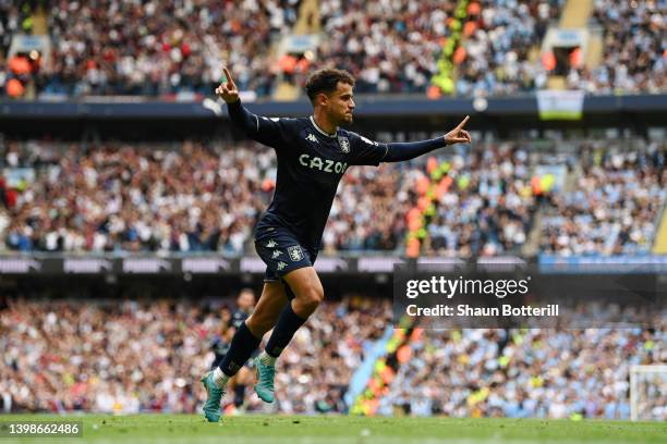 Philippe Coutinho of Aston Villa celebrates after scoring their team's second goal during the Premier League match between Manchester City and Aston...