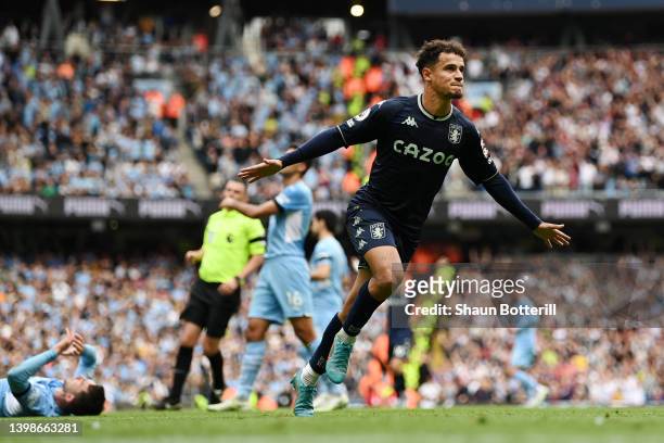 Philippe Coutinho of Aston Villa celebrates after scoring their team's second goal during the Premier League match between Manchester City and Aston...