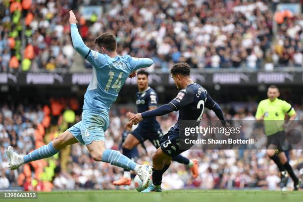 Philippe Coutinho of Aston Villa scores their team's second goal during the Premier League match between Manchester City and Aston Villa at Etihad...