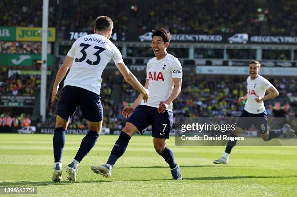 Son Heung-Min of Tottenham Hotspur celebrates with team mate Ben Davies after scoring their fifth goal during the Premier League match between...