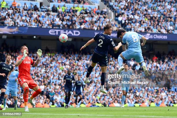 Ilkay Guendogan of Manchester City scores their team's first goal during the Premier League match between Manchester City and Aston Villa at Etihad...