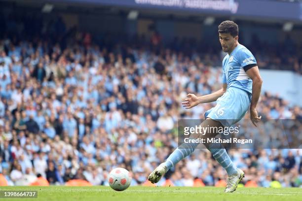 Rodrigo of Manchester City scores their team's second goal during the Premier League match between Manchester City and Aston Villa at Etihad Stadium...