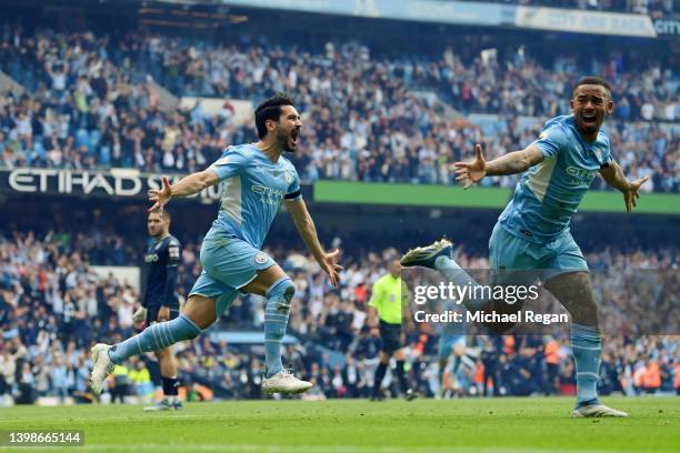 Ilkay Guendogan of Manchester City celebrates after scoring their team's third goal during the Premier League match between Manchester City and Aston...