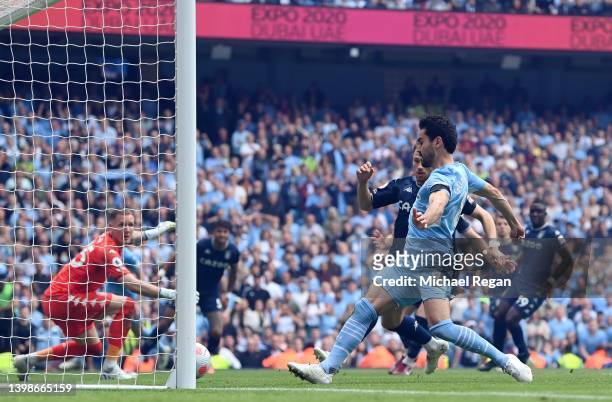 Ilkay Guendogan of Manchester City scores their team's third goal during the Premier League match between Manchester City and Aston Villa at Etihad...