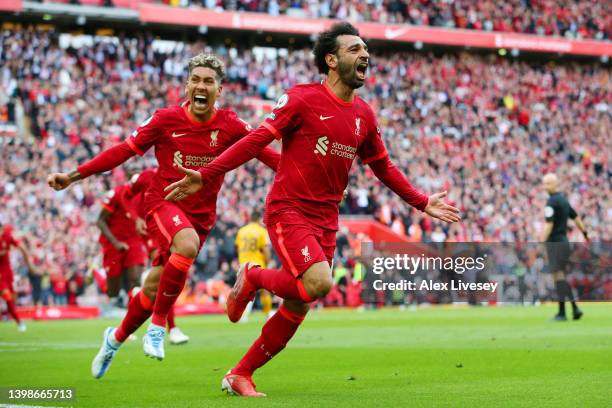 Mohamed Salah of Liverpool celebrates after scoring their sides second goal during the Premier League match between Liverpool and Wolverhampton...