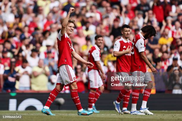 Martin Oedegaard of Arsenal celebrates after scoring their team's fifth goal during the Premier League match between Arsenal and Everton at Emirates...