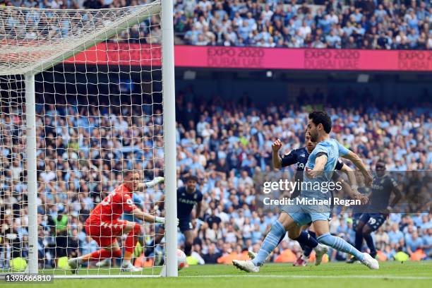 Ilkay Guendogan of Manchester City scores their team's third goal during the Premier League match between Manchester City and Aston Villa at Etihad...