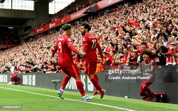 Mohamed Salah of Liverpool celebrates after scoring the second goal making the score 2-1 during the Premier League match between Liverpool and...