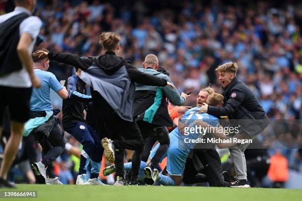 Kevin De Bruyne of Manchester City celebrates with the fans after their side finished the season as Premier League champions during the Premier...
