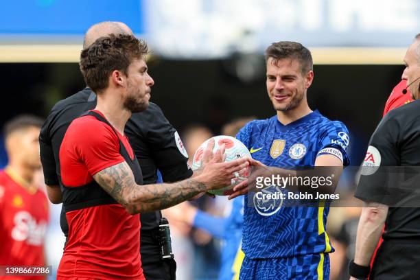 Referee Mike Dean, is handed match ball by Cesar Azpilicueta of Chelsea, Dean officiating his last game after the Premier League match between...