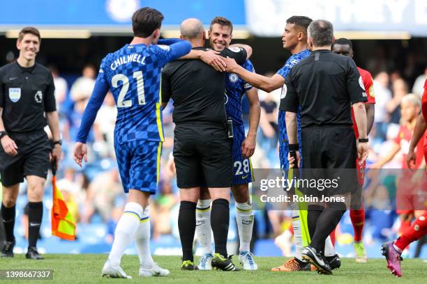 Referee Mike Dean with Cesar Azpilicueta of Chelsea, Dean officiating his last game after the Premier League match between Chelsea and Watford at...