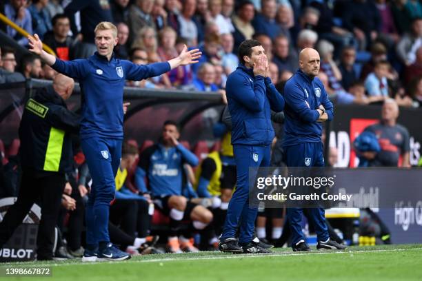 Mike Jackson, Interim Manager of Burnley and Paul Jenkins , Coach of Burnley look dejected during the Premier League match between Burnley and...