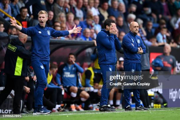 Mike Jackson, Interim Manager of Burnley and Paul Jenkins , Coach of Burnley look dejected during the Premier League match between Burnley and...