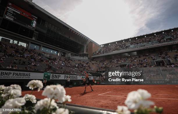 Maria Sakkari of Greece plays a forehand against Clara Burel of France during the Women's Singles First Round match on Day 1 of The 2022 French Open...