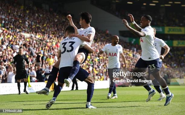 Son Heung-Min of Tottenham Hotspur celebrates with team mate Ben Davies after scoring their fifth goal during the Premier League match between...