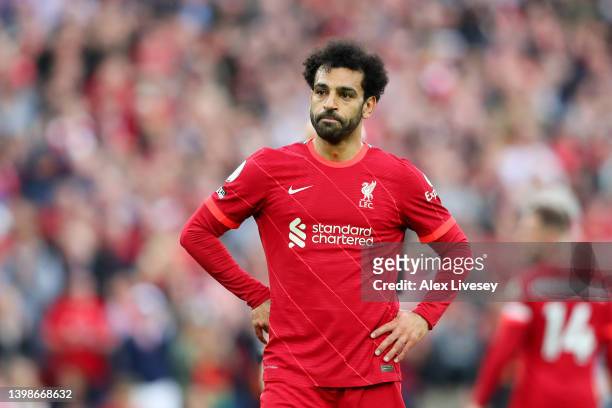 Mohamed Salah of Liverpool looks dejected as Manchester City finish the 2021/2022 season as champions following the Premier League match between...