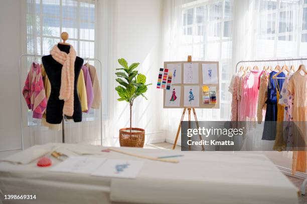 a dressmakers model in clothing design studio. - stylist bildbanksfoton och bilder