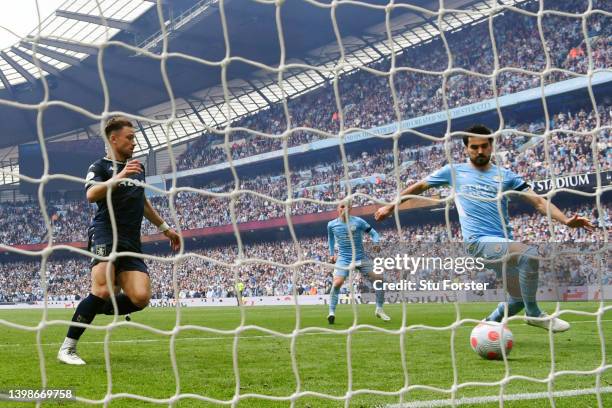 Ilkay Guendogan of Manchester City scores their team's third goal during the Premier League match between Manchester City and Aston Villa at Etihad...