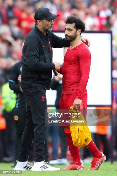 Jurgen Klopp, Manager of Liverpool and Mohamed Salah of Liverpool look dejected as Manchester City finish the 2021/2022 season as champions following...