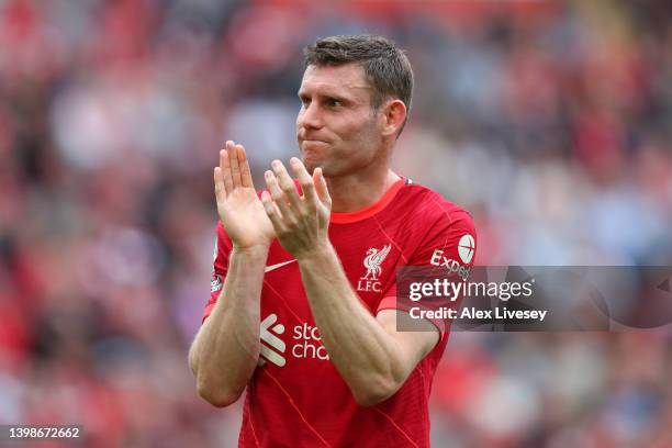 James Milner of Liverpool applauds fans after the Premier League match between Liverpool and Wolverhampton Wanderers at Anfield on May 22, 2022 in...