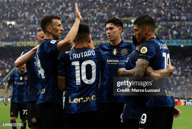 Joaquin Correa of FC Internazionale celebrates with Ivan Perisic and teammates after scoring their side's third goal during the Serie A match between...