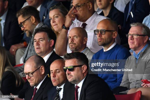 Incoming manager Eric ten Hag, Mitchell van der Gaag and Steve McClaren of Manchester United watches from the directors' box ahead of the Premier...