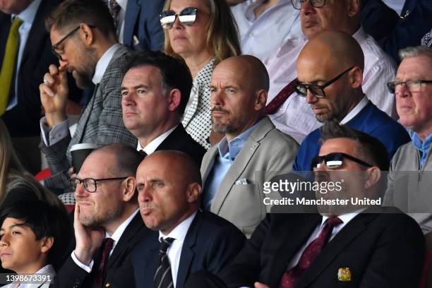 Incoming manager Eric ten Hag, Mitchell van der Gaag and Steve McClaren of Manchester United watches from the directors' box ahead of the Premier...