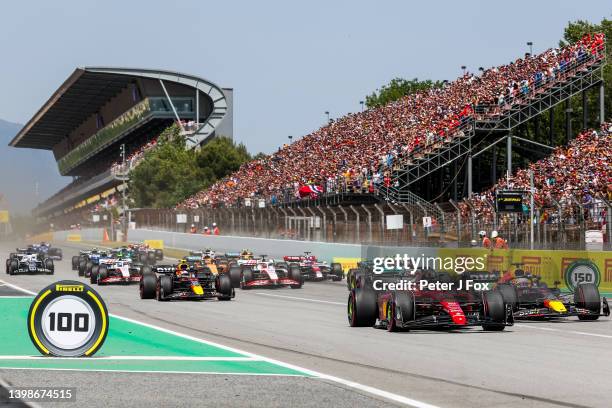 Charles Leclerc of Ferrari and Monaco leads at the start during the F1 Grand Prix of Spain at Circuit de Barcelona-Catalunya on May 22, 2022 in...