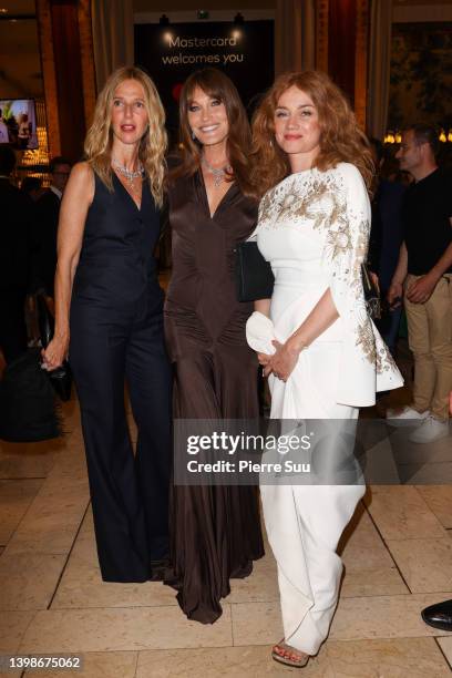 Sandrine Kiberlain,Carla Bruni and Marine Delterme are seen at Le Majestic Hotel during the 75th annual Cannes film festival at on May 22, 2022 in...