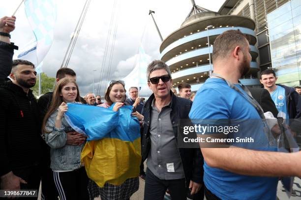 Noel Gallagher, Musician and Manchester City fan leaves the stadium after their side finished the season as Premier League champions during the...