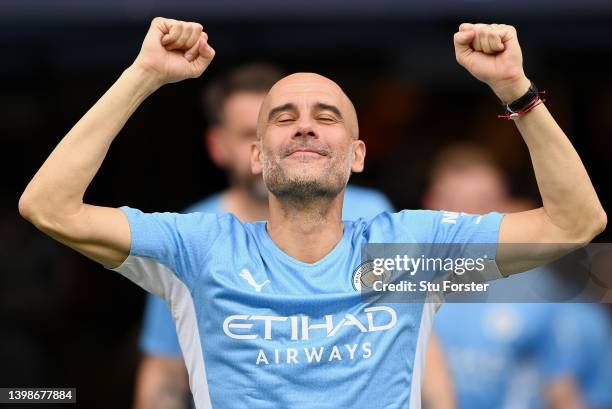 Pep Guardiola, Manager of Manchester City celebrates after their side finished the season as Premier League champions during the Premier League match...