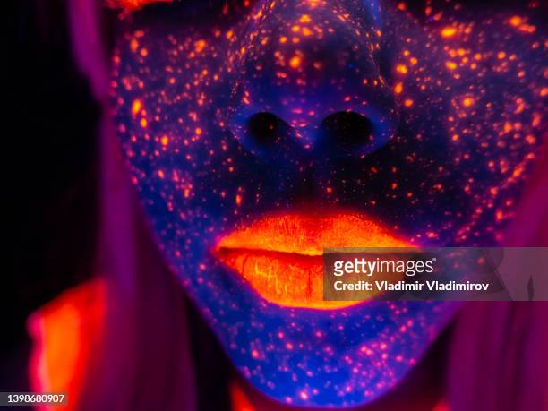 close up of a neon light portrait of a young woman - cyber punk girl stock pictures, royalty-free photos & images