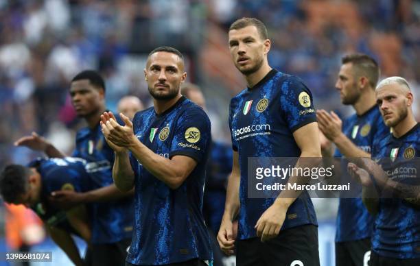 Danilo D'Ambrosio and Edin Dzeko of FC Internazionale applaud fans following the Serie A match between FC Internazionale and UC Sampdoria at Stadio...