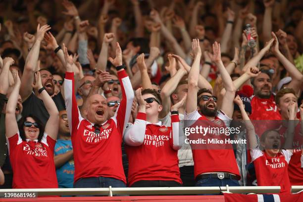 Arsenal fans in party mood during their 5-1 win in the Premier League match between Arsenal and Everton at Emirates Stadium on May 22, 2022 in...