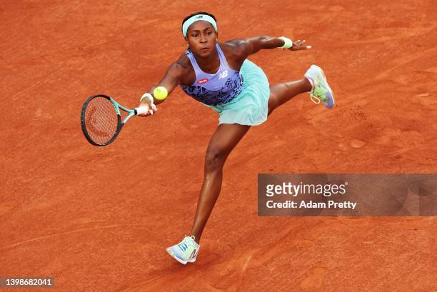 Coco Gauff of the United States plays a forehand during her womens singles first round match against Rebecca Marino of Canada on day 1 of the 2022...