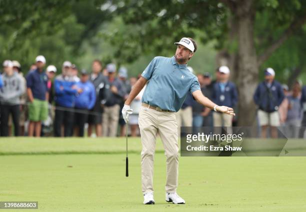 Bubba Watson of the United States reacts to his second shot on the first hole during the final round of the 2022 PGA Championship at Southern Hills...