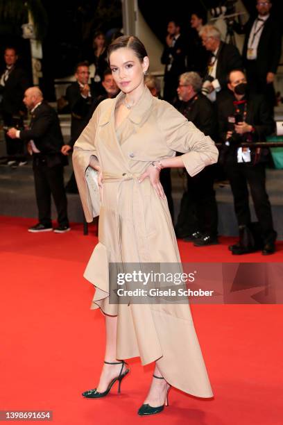 Emilia Schüle attends the screening of "November " during the 75th annual Cannes film festival at Palais des Festivals on May 22, 2022 in Cannes,...