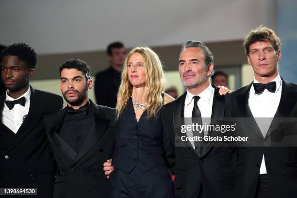 Stéphane Bak, Sami Outalbali, Sandrine Kiberlain, Jean Dujardin and Cédric Jimenez attend the screening of "November " during the 75th annual Cannes...