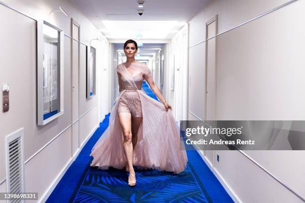 Catrinel Marlon poses for the photographer during the 75th annual Cannes film festival at on May 22, 2022 in Cannes, France.