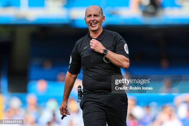 Referee Mike Dean during the Premier League match between Chelsea and Watford at Stamford Bridge on May 22, 2022 in London, England.