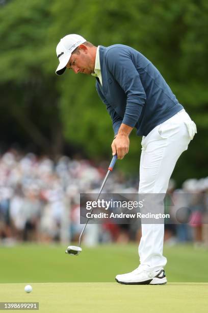 Lucas Herbert of Australia putts on the eighth green during the final round of the 2022 PGA Championship at Southern Hills Country Club on May 22,...