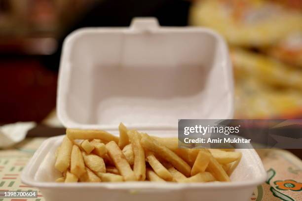 french fries serving in a disposable food container. - takeaway box stock pictures, royalty-free photos & images