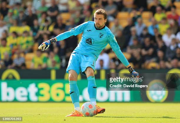 Tim Krul of Norwich City passes the ball during the Premier League match between Norwich City and Tottenham Hotspur at Carrow Road on May 22, 2022 in...