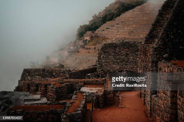 constructions of houses in the citadel of machu picchu - ancient civilisation inca stock pictures, royalty-free photos & images