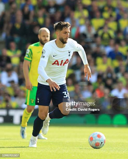 Rodrigo Bentancur of Tottenham Hotspur runs with the ball during the Premier League match between Norwich City and Tottenham Hotspur at Carrow Road...