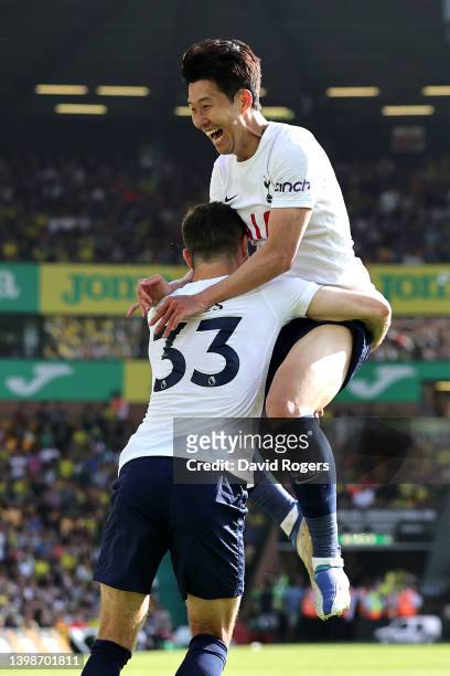 Son Heung-Min of Tottenham Hotspur celebrates with team mate Ben Davies after scoring their fifth goal during the Premier League match between...