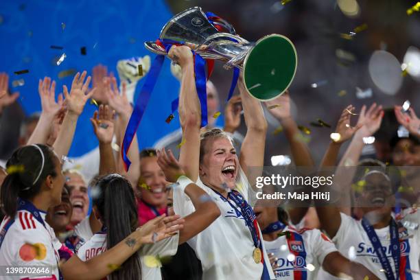 Ada Hegerberg of Olympique Lyonnais holds a trophy after the UEFA Women's Champions League final match between FC Barcelona and Olympique Lyon at...