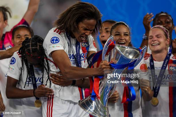 Wendie Renard of Olympique Lyonnais holds the trophy after the UEFA Women's Champions League final match between FC Barcelona and Olympique Lyon at...