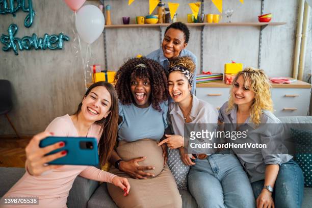 selfie at the baby shower - baby shower party stock pictures, royalty-free photos & images